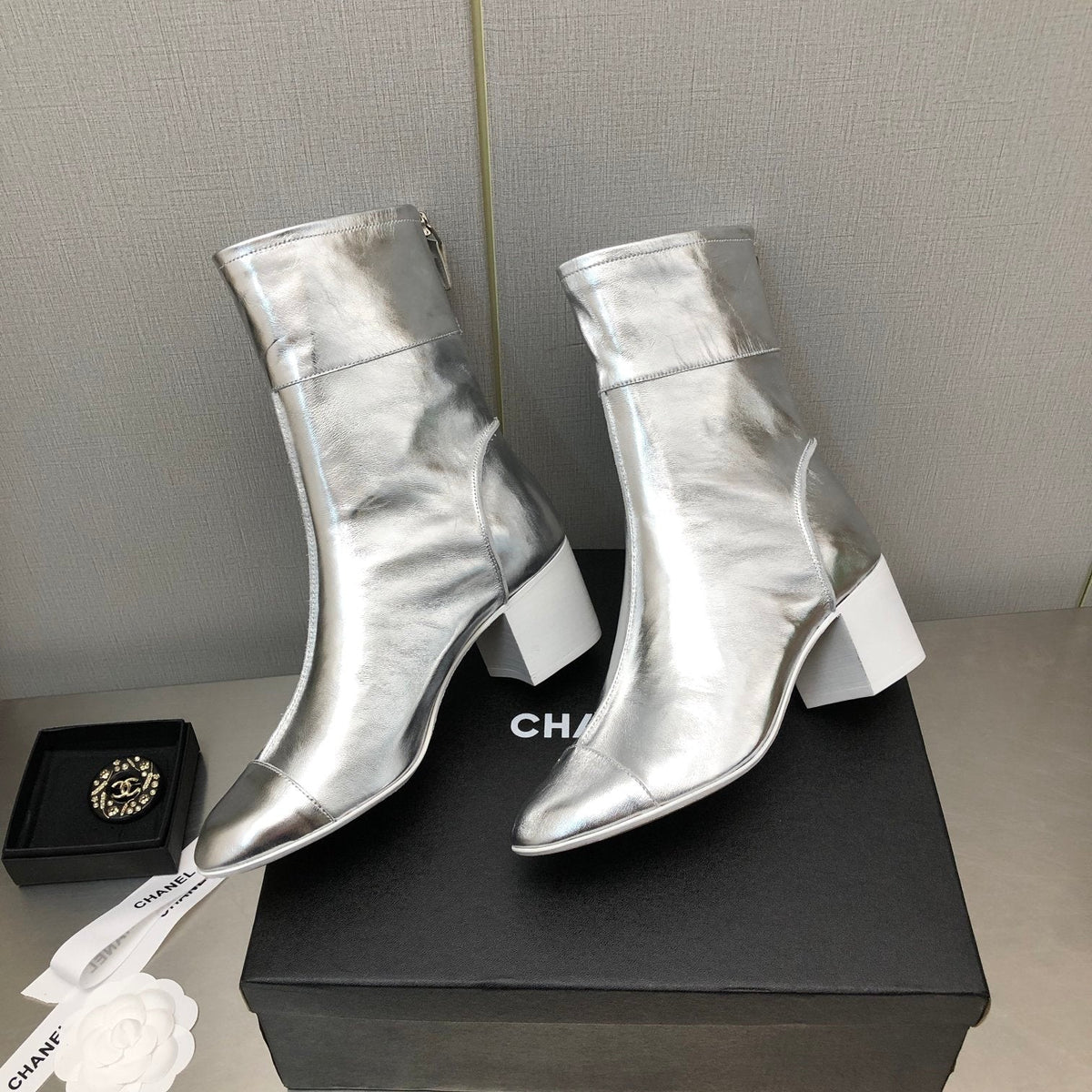 CHANEL BLOCK HEEL ANKLE BOOTS IN SILVER CALFSKIN