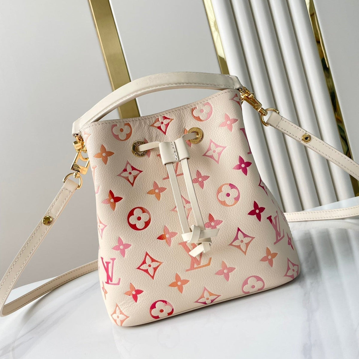 LOUIS VUITTON NÉONOÉ BB 20 IN SUNRISE AQUARELLE MONOGRAM EMPREINTE LEATHER