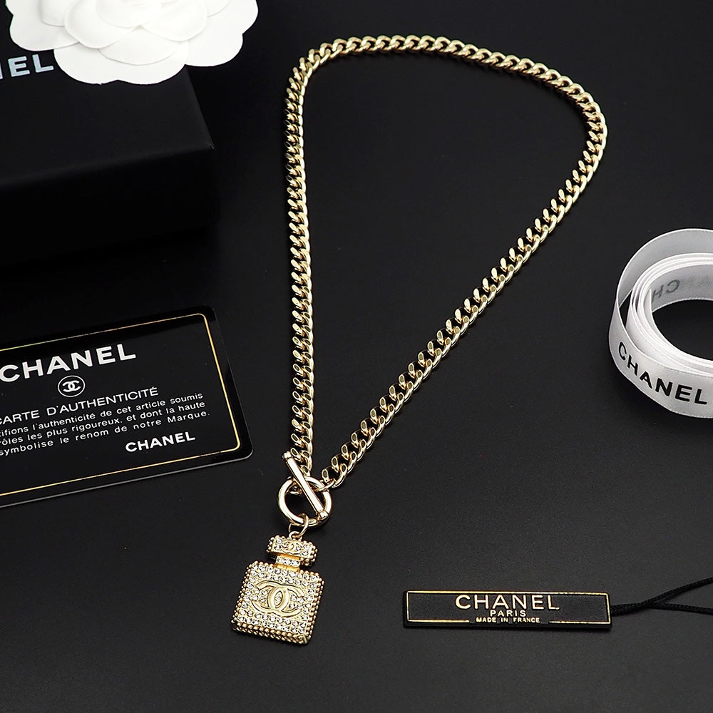 18K  Chanel Diamond Perfume Bottle Pendant Necklace