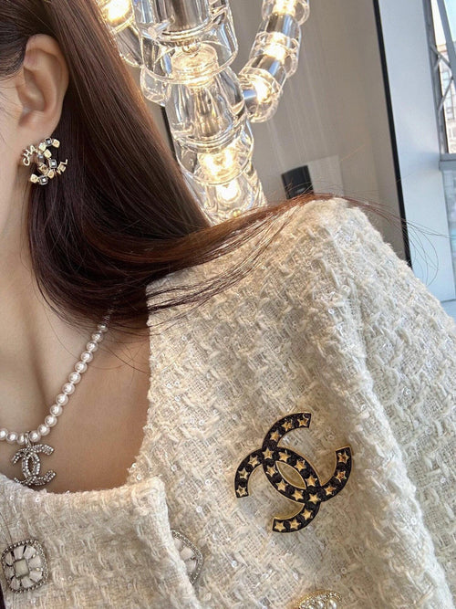 18K  Chanel Black Star Brooch