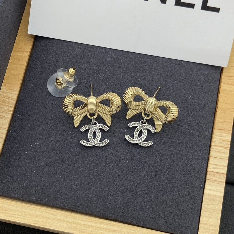 18K  Chanel Bow Tie Gold Earrings
